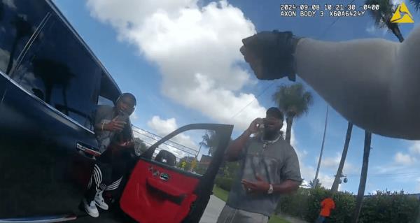 Other Dolphins teammates came onto the scene and interacted with officers.